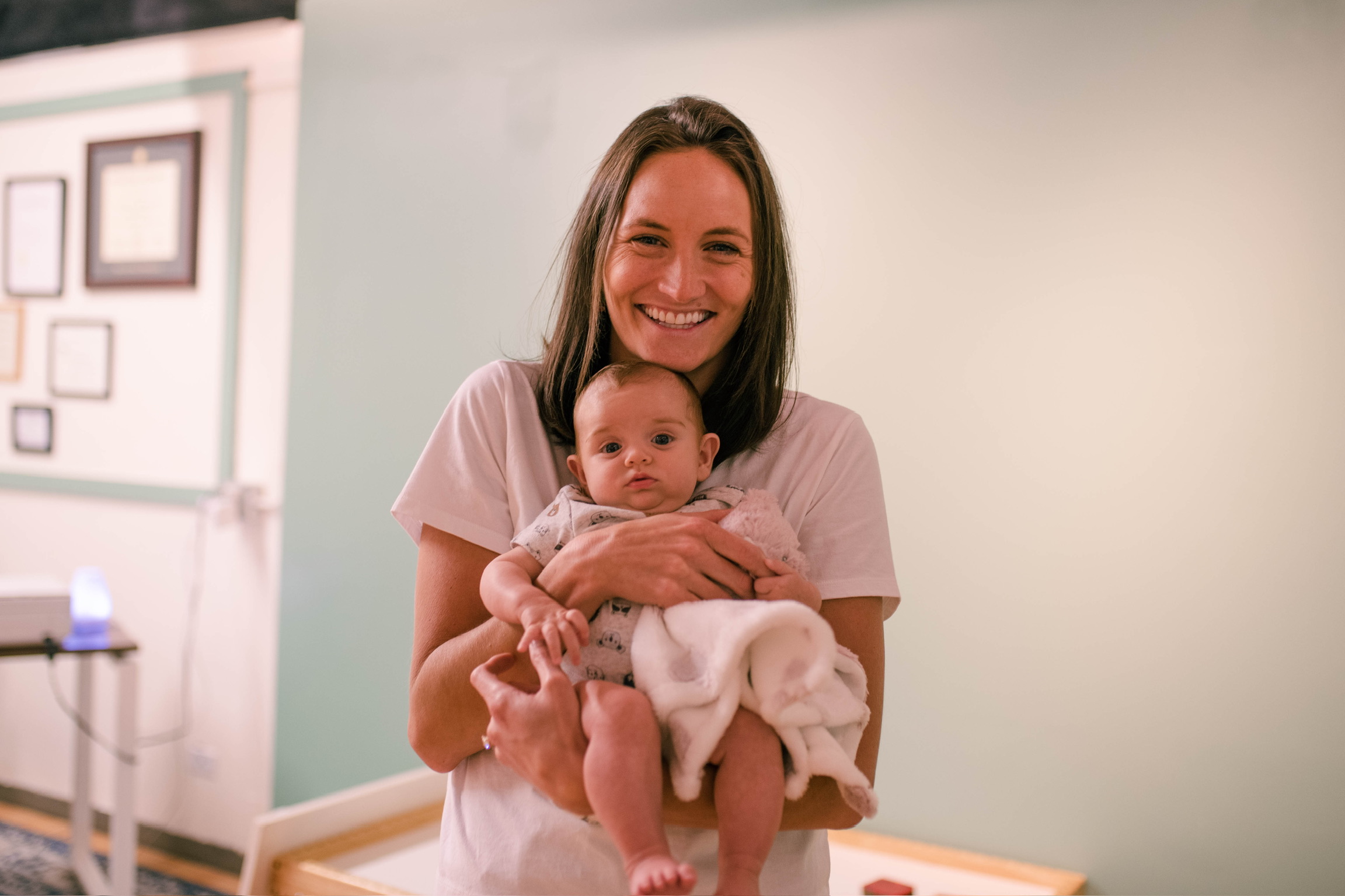 Happy family after Denver chiropractor appointment at Calmbody Chiropractic Club